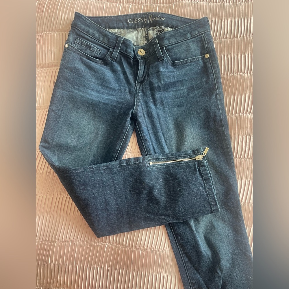 Denim with zipper detail in the bottom  very good quality and wash